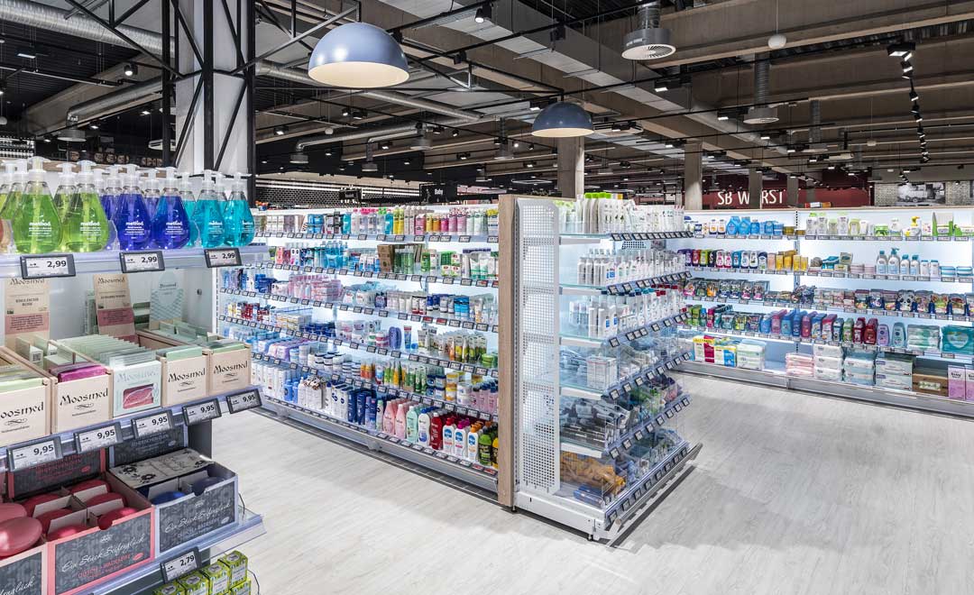 Cosmetics department illuminated with the decorative suspended luminaire, Globe.